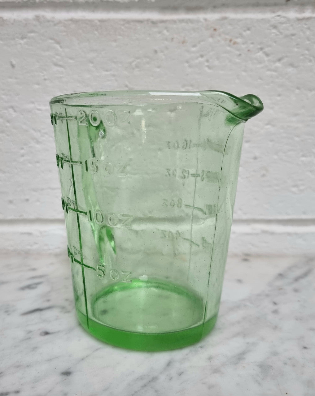Vintage green depression glass jug. In good original condition.