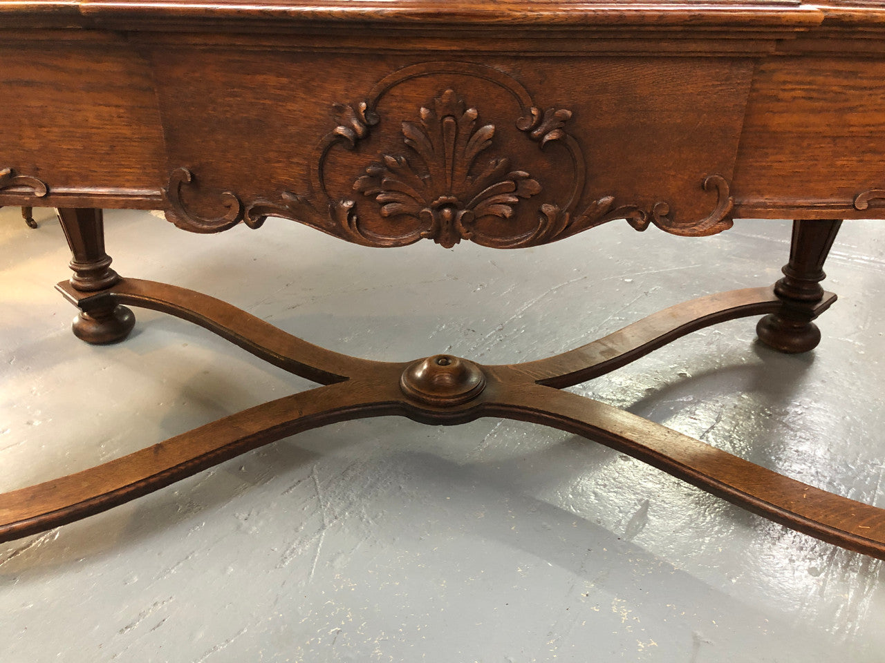 Beautifully carved 19th century French oak Bureau Plat. With a lovely parquetry top and two drawers and decorative carved legs this piece is definitely one to look at . In good original detailed condition.
