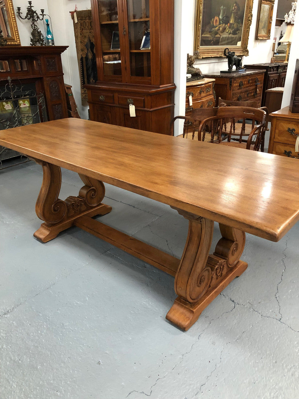 French oak fixed farmhouse table with a charming harp-shaped base. In good original condition and can seat 6-8 people. Circa 1930.