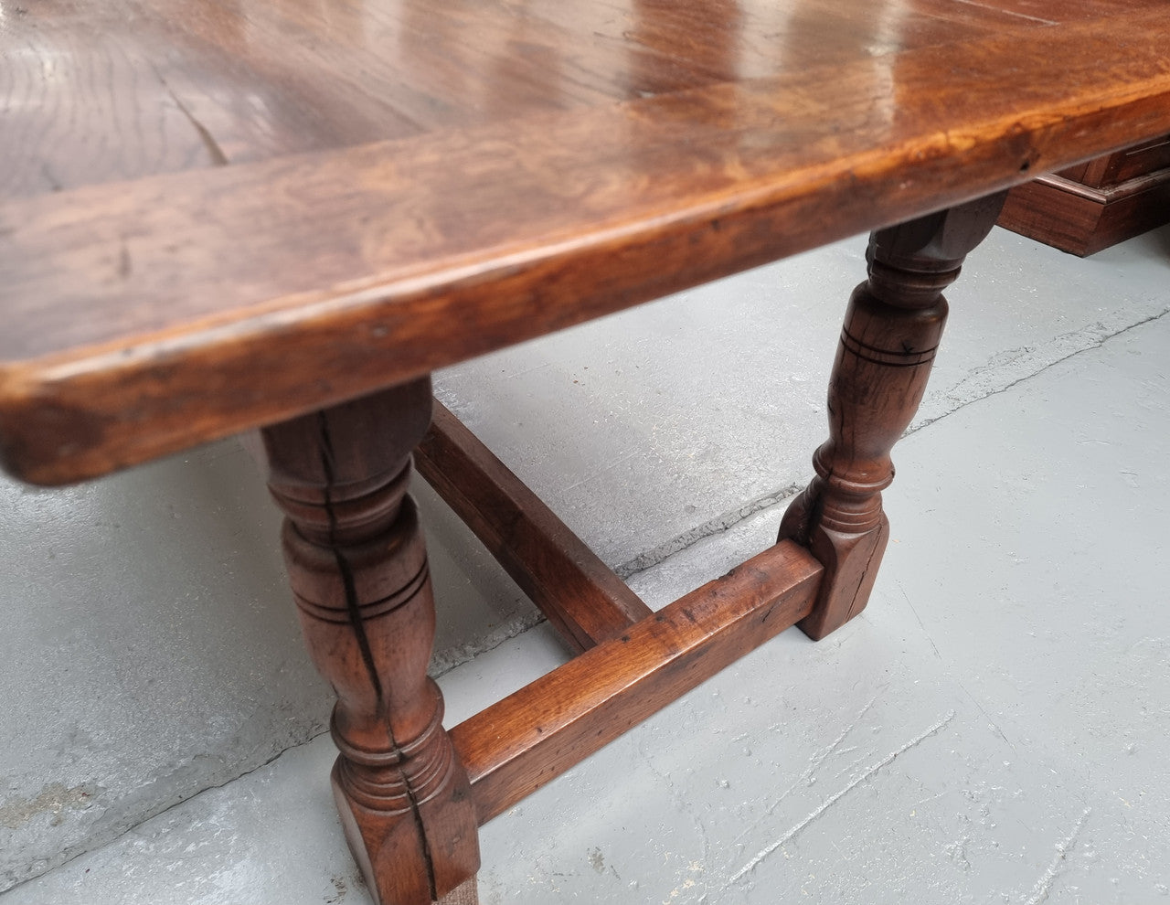 Vintage French Oak stretcher base farmhouse table. It is in good original condition.