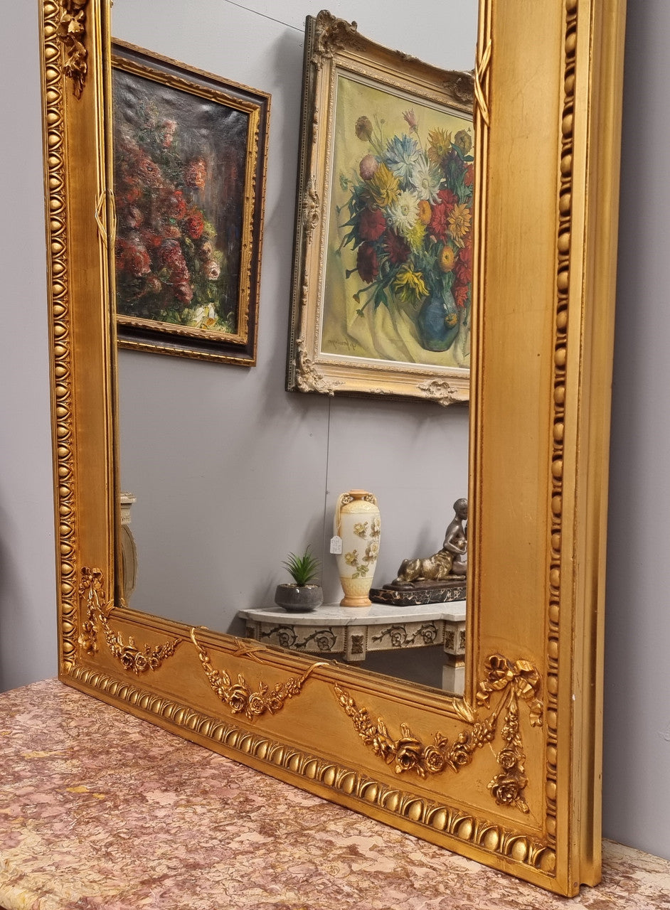 Stunning Vintage French floral gilt framed overmantel mirror. It has been sourced from France and is in good original detailed condition.