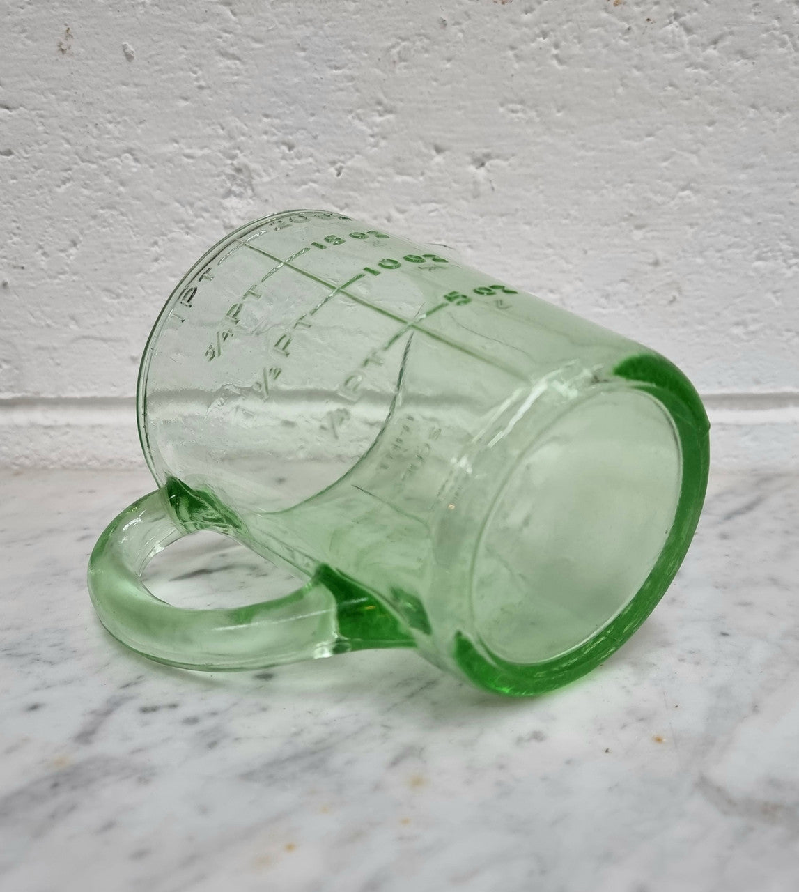 Vintage green depression glass jug. In good original condition.