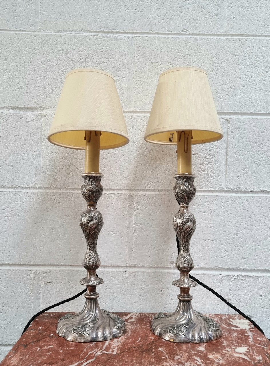 Pair of Antique French silver candlesticks table lamps embossed with birds and floral pattern. In good original detailed working condition.
