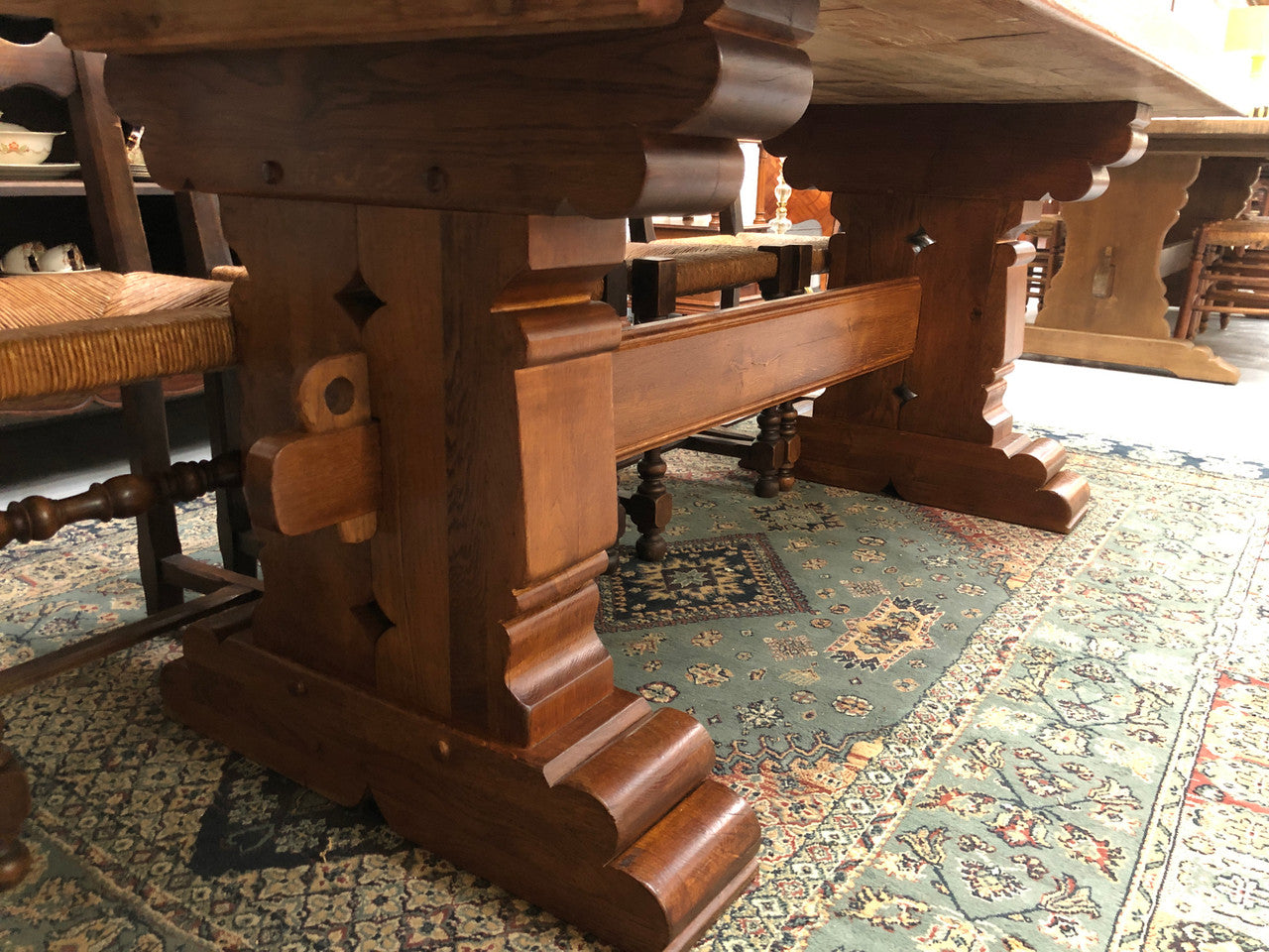 French Farmhouse table with a beautiful thick plank top and stretcher base. Can seat 8-10 people comfortably and is in good original detailed condition.