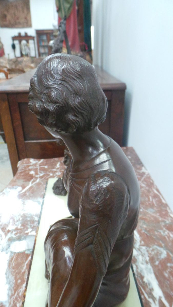 An Art Deco bronze statue with brown patina, of a lady and parrot on a marble base. Signed by Italian Sculptor A Trefoloni, an important and highly regarded sculptor. The statue is in very good condition.