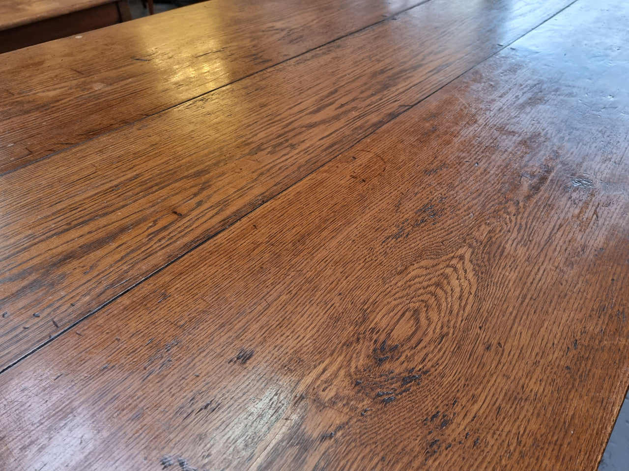 Amazing 19th Century French Oak Farmhouse Style Dining Table with three drawers. It is made from 3 large planks of wood which is very hard to find. 105.5 cm wide.
