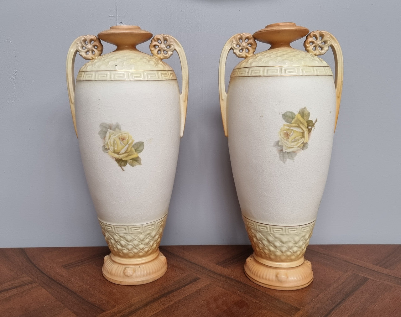 Lovely pair of Edwardian floral vases from Austria with beautiful roses on them in good original condition. Some crazing throughout please view photos as they help form past of the description.