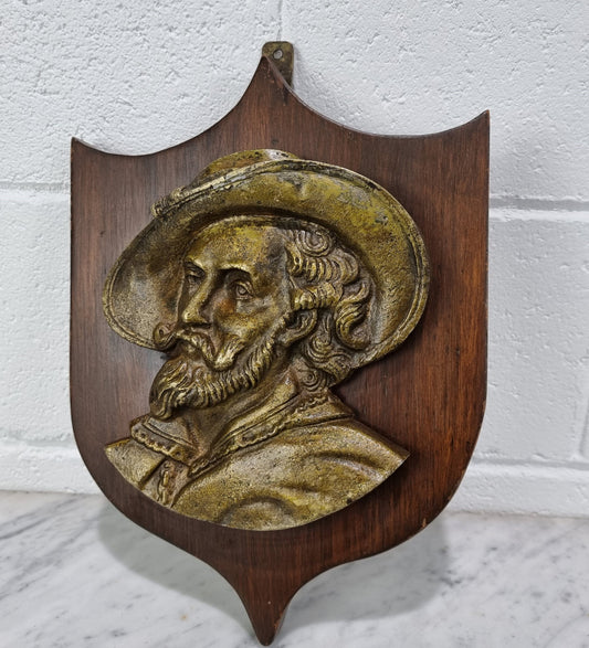 Antique Bronze plaque of a man plaque on a Mahogany panel. In good original detailed condition.