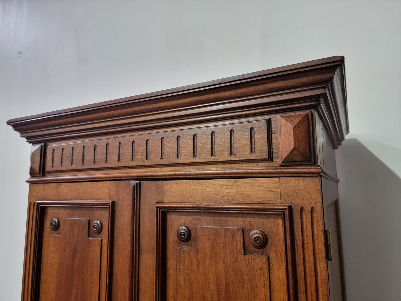 French Henry II style Walnut linen storage cupboard with nine pull out shelves. This piece could be very functional for a range of different purposes including shoe storage. It is in good original detailed condition, please note the door lock no longer functions and opens by pulling the door.