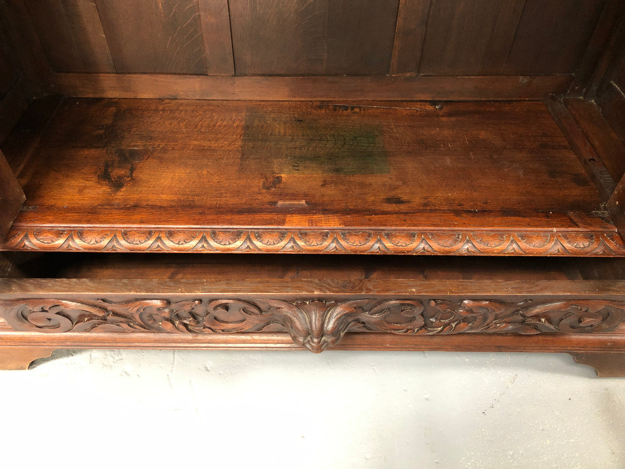 Amazing dark Oak heavily carved Gothic style bookcase with lovely details and adjustable shelves in good original detailed condition. The doors currently have no glass which can easily be added or be left with open shelves.