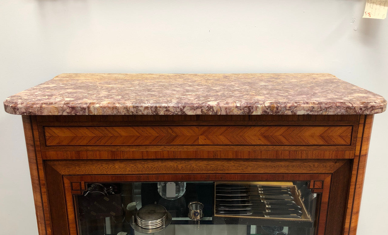 Beautiful French walnut and parquetry inlaid vitrine with lovely bevelled glass and a marble top. It comes with four glass shelves which are adjustable and it is in good original condition.