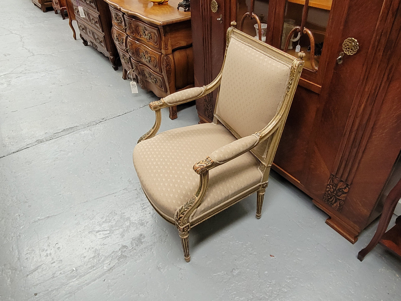 Louis XV style painted Fauteuil chair with attractive fabric upholstery. It has been sourced from France and is in good original detailed condition. The upholstery is in very good used condition, please view photos as they help for part of the description.