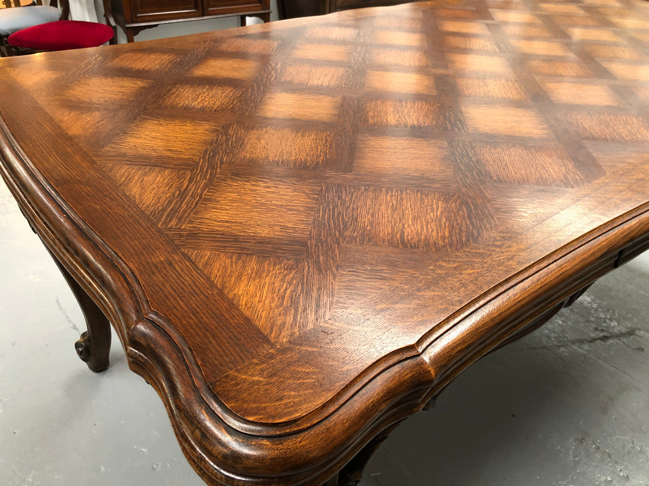 High quality French Oak Louis XV Style, beautifully carved extension table. It has an amazing parquetry top and when fully extended measures to 3 meters long. In very good original detailed condition.