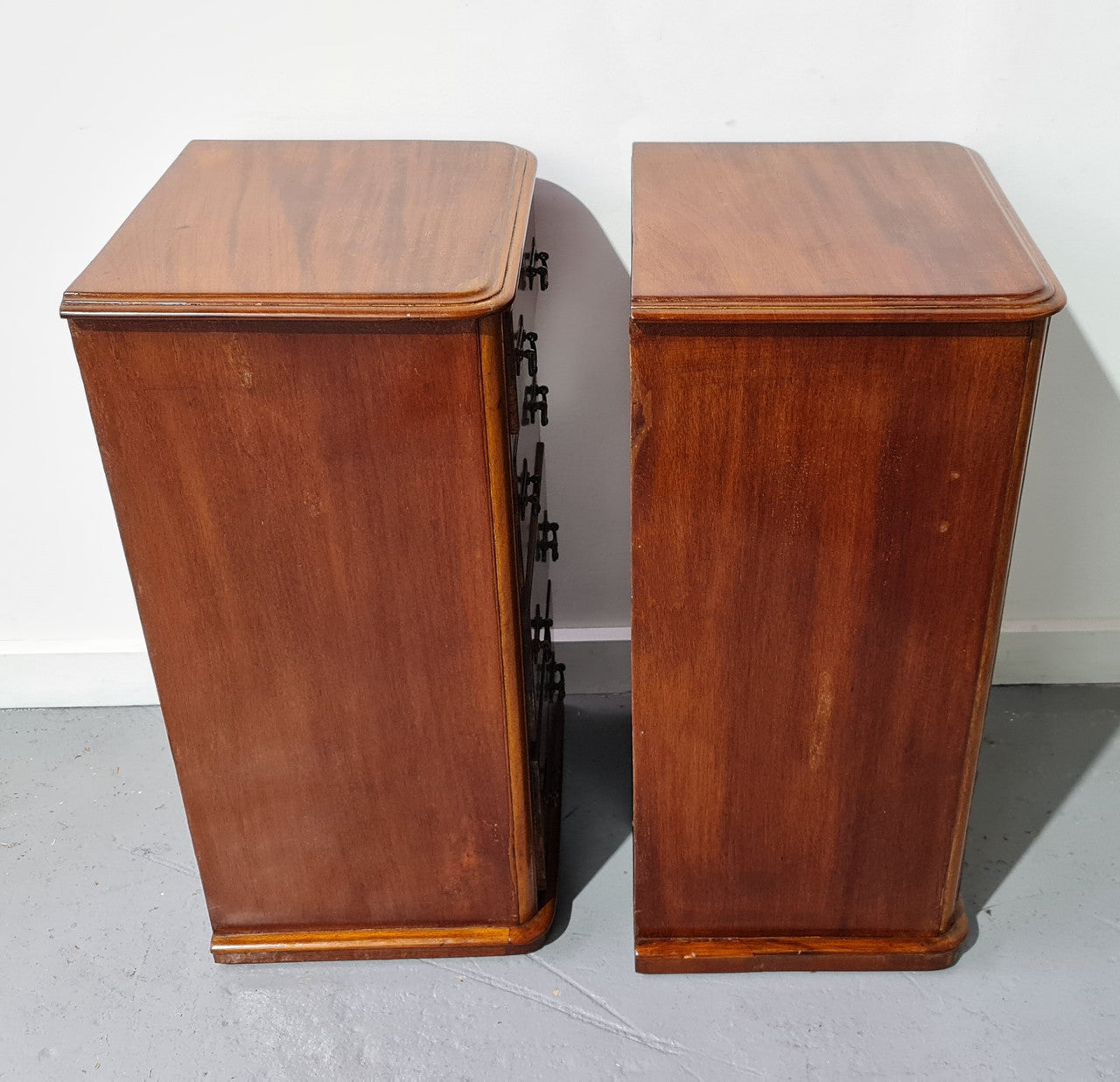 Pair of English Victorian Mahogany bedside drawers. In good original detailed condition.