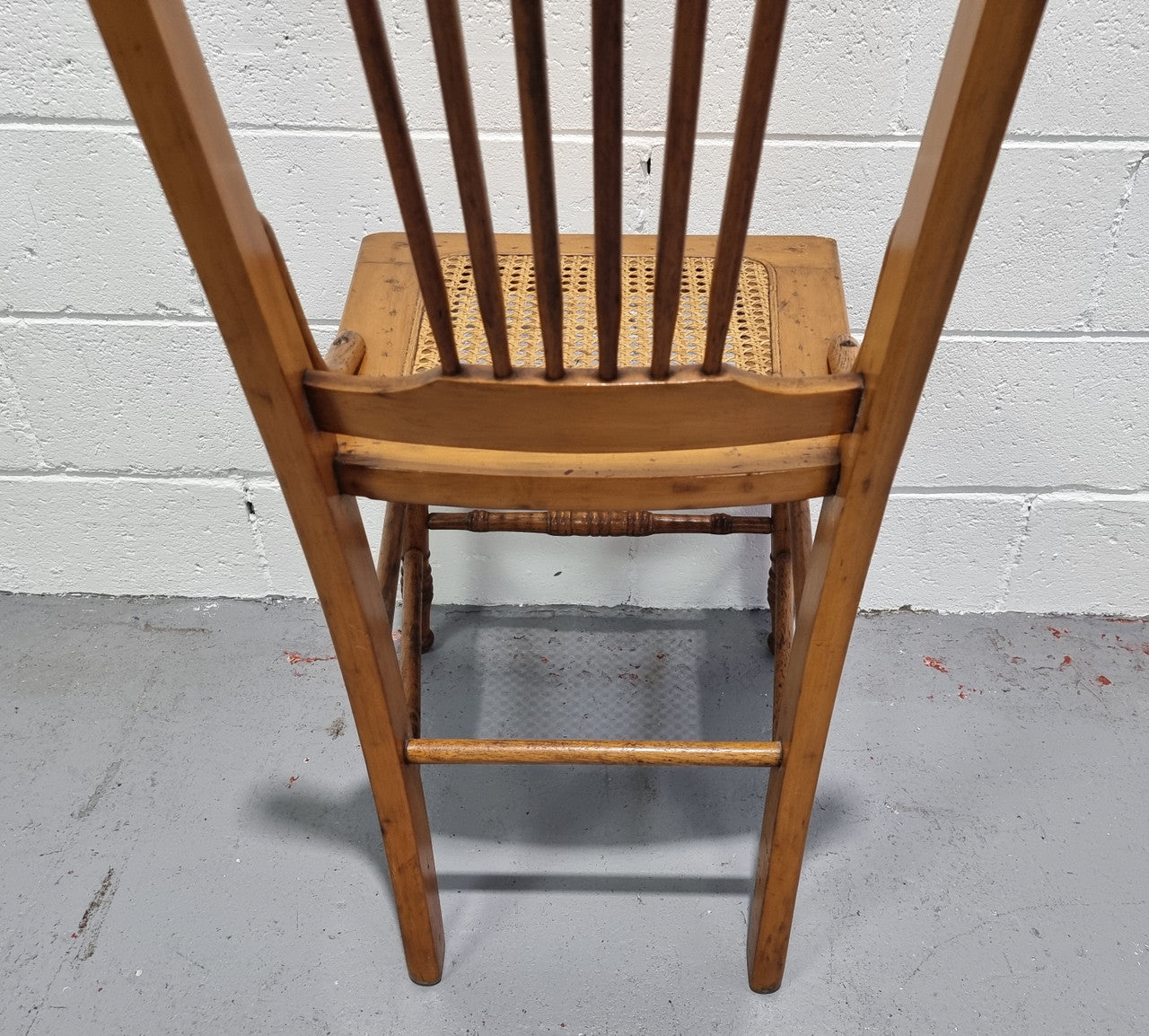 Australian Emu chair with cane inset seat. In good original condition.