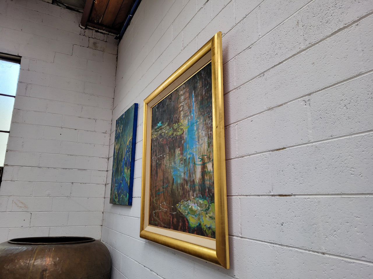 A beautiful Framed oil on canvas in vibrant colours and framed in a lovely gold frame. This piece is signed by artist John Cumming from "The Mill Gallery" and still has its original gallery card as shown in picture. It is in good original condition.