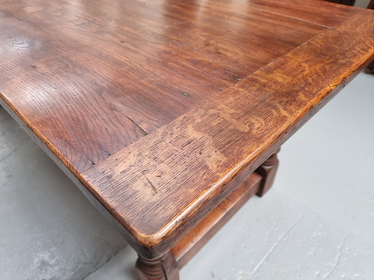 Vintage French Oak stretcher base farmhouse table. It is in good original condition.