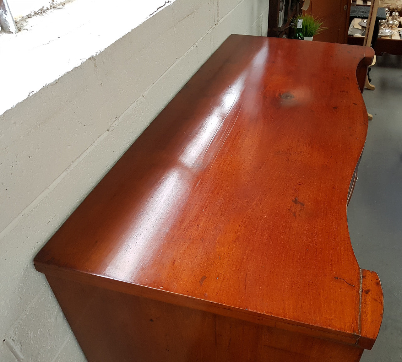 Victorian Flame Mahogany chest of eight drawers. Wooden handles with inlaid mother of pearl, hat drawer has key and lock that works. In good original condition, all drawers run smoothly.