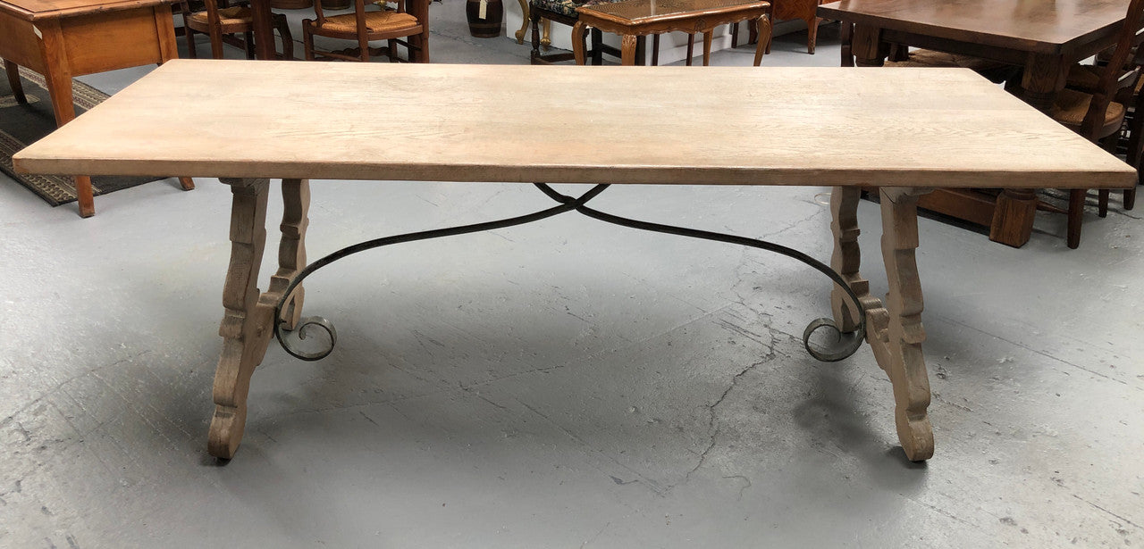 Limed French Oak Farmhouse table with decorative iron base. In good original detailed condition.
