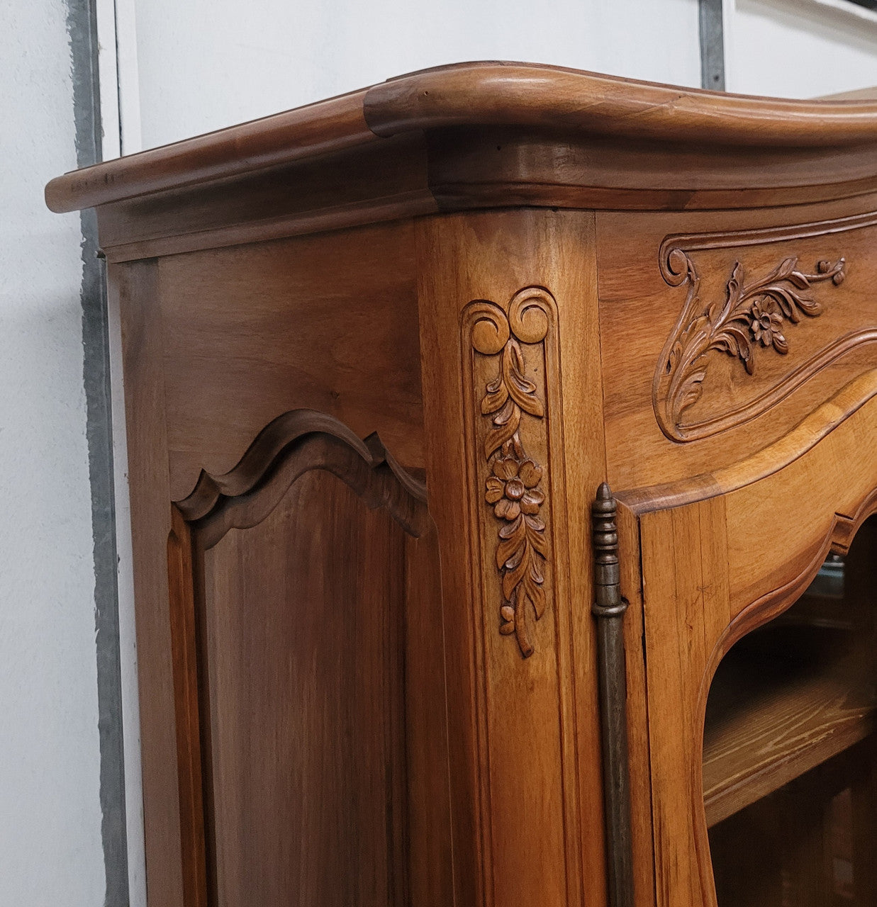 Magnificent French Walnut two-body four door display cabinet. Heaps of storage space with four glass doors at the top with shelves and four solid doors below also with shelving. It has been sourced from France and comes with a key for each door and all are lockable. In good original detailed condition.