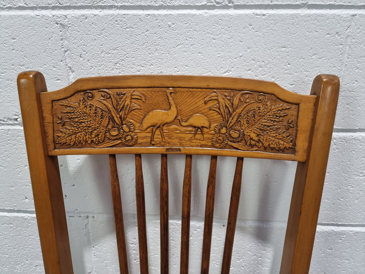 Australian Emu chair with cane inset seat. In good original condition.