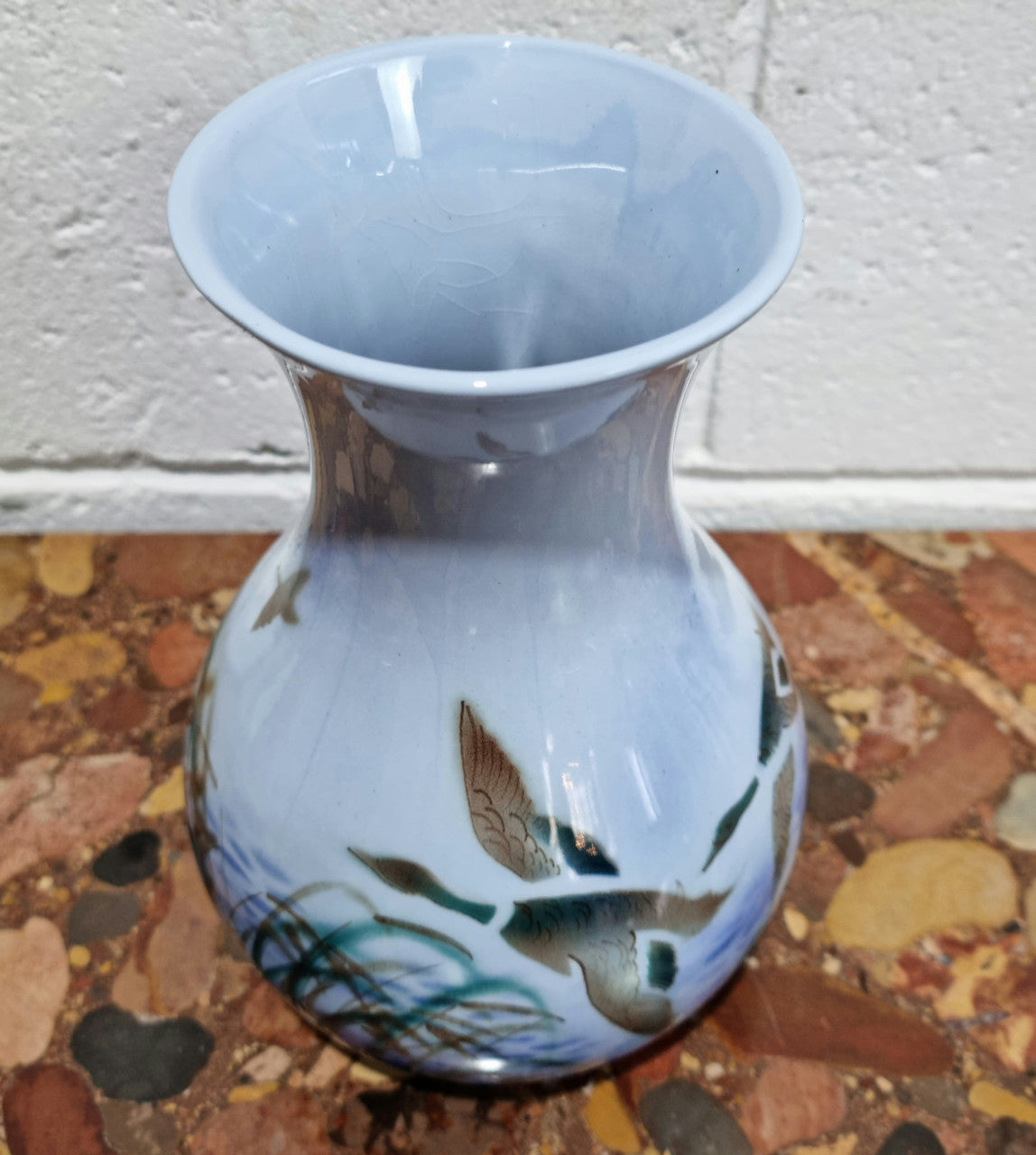Lovely vintage vase by Falconware potteries, featuring ducks flying over reeds on a lake. It has some crazing, but no damage. Good condition, commensurate with the age, please view photos.
