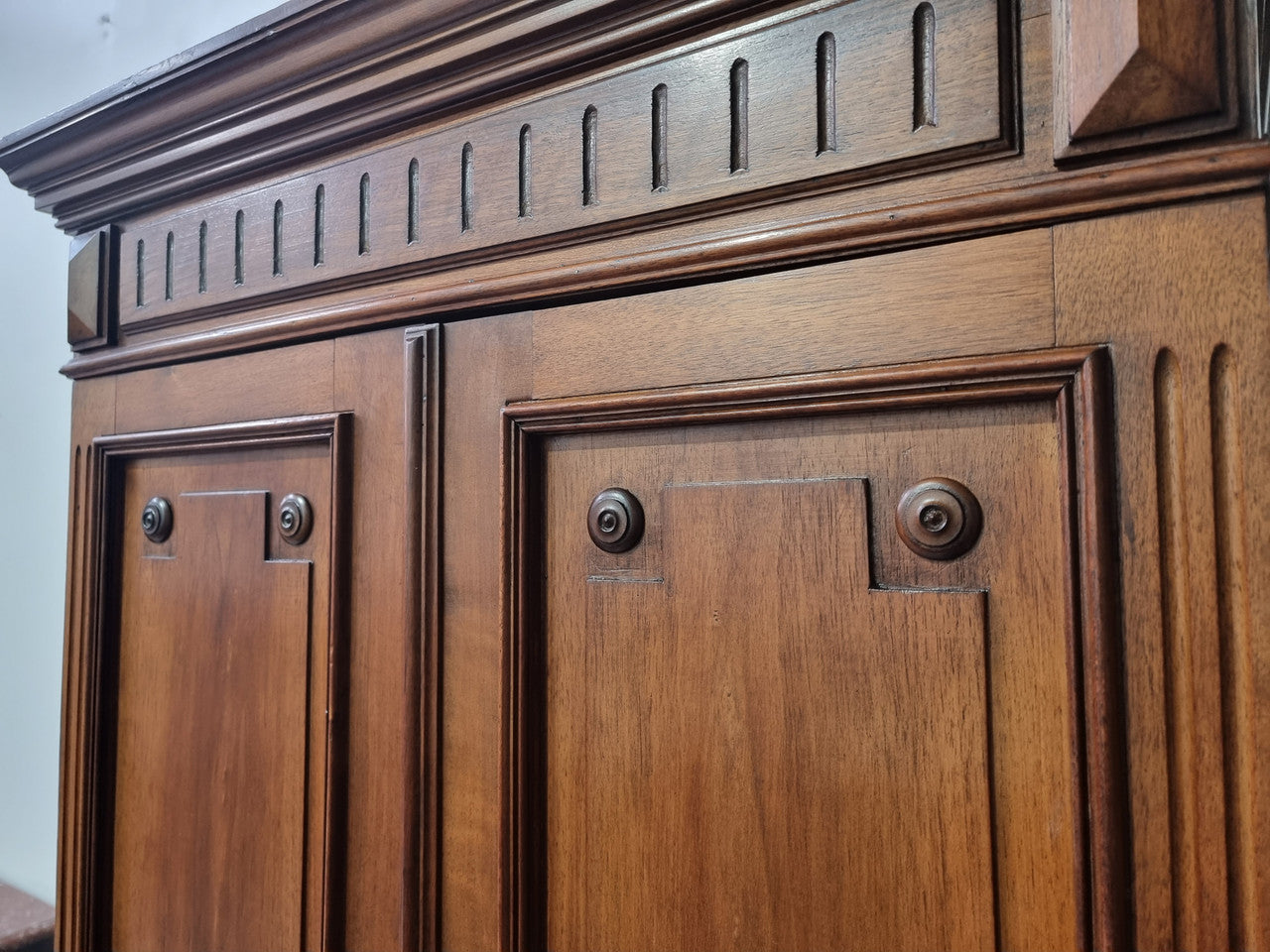 French Henry II style Walnut linen storage cupboard with nine pull out shelves. This piece could be very functional for a range of different purposes including shoe storage. It is in good original detailed condition, please note the door lock no longer functions and opens by pulling the door.