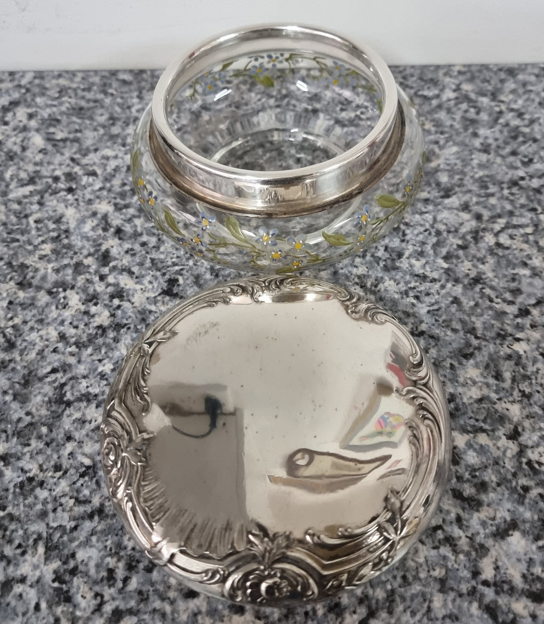 Silver lidded dressing table powder/trinket bowl with beautifully hand-painted floral enamel. In good condition please view photos as they help form part of the description.
