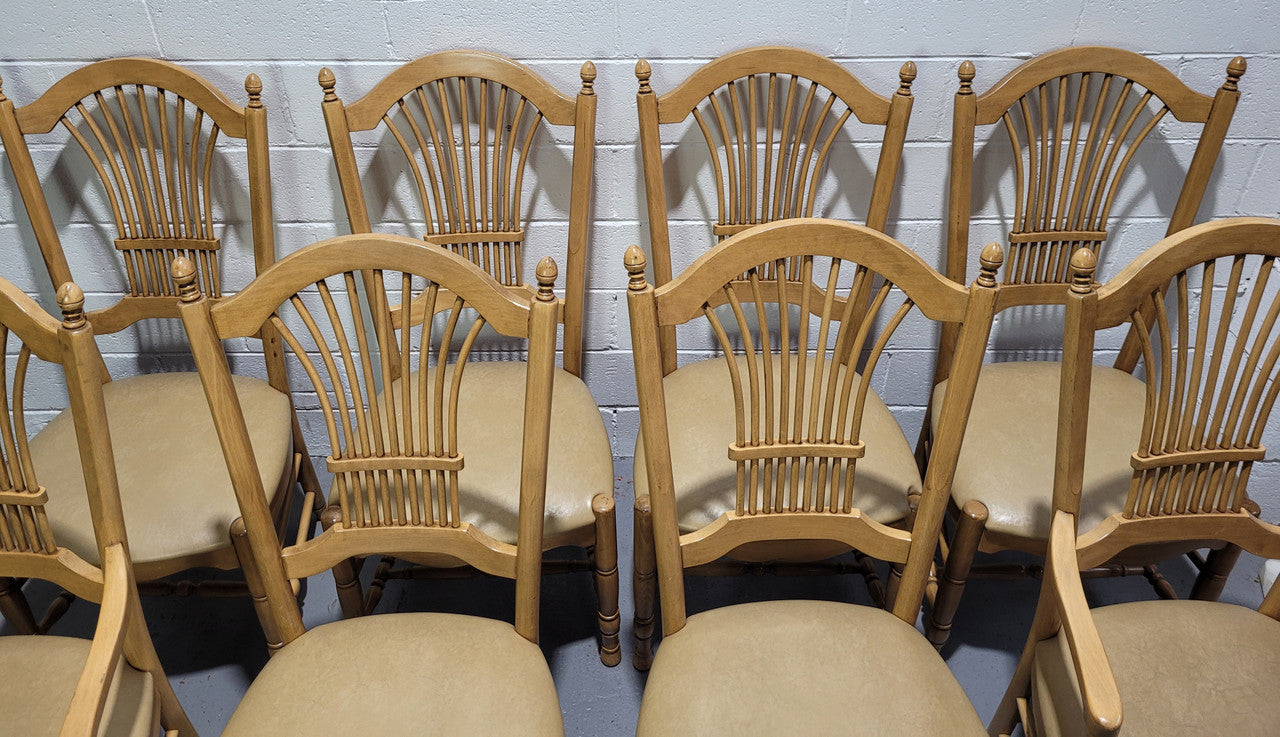 French country style set of six dining chairs and two carvers with leather seats. They are all in good original detailed condition.
