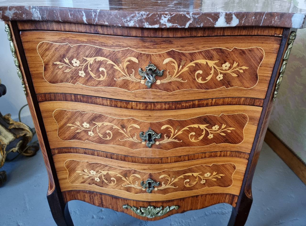 Lovely french 3 drawer Rosewood and Kingwood ,marquetry inlaid commode. There are 3 drawers and a lovely marble top with ormolu mounts in good original detailed condition.