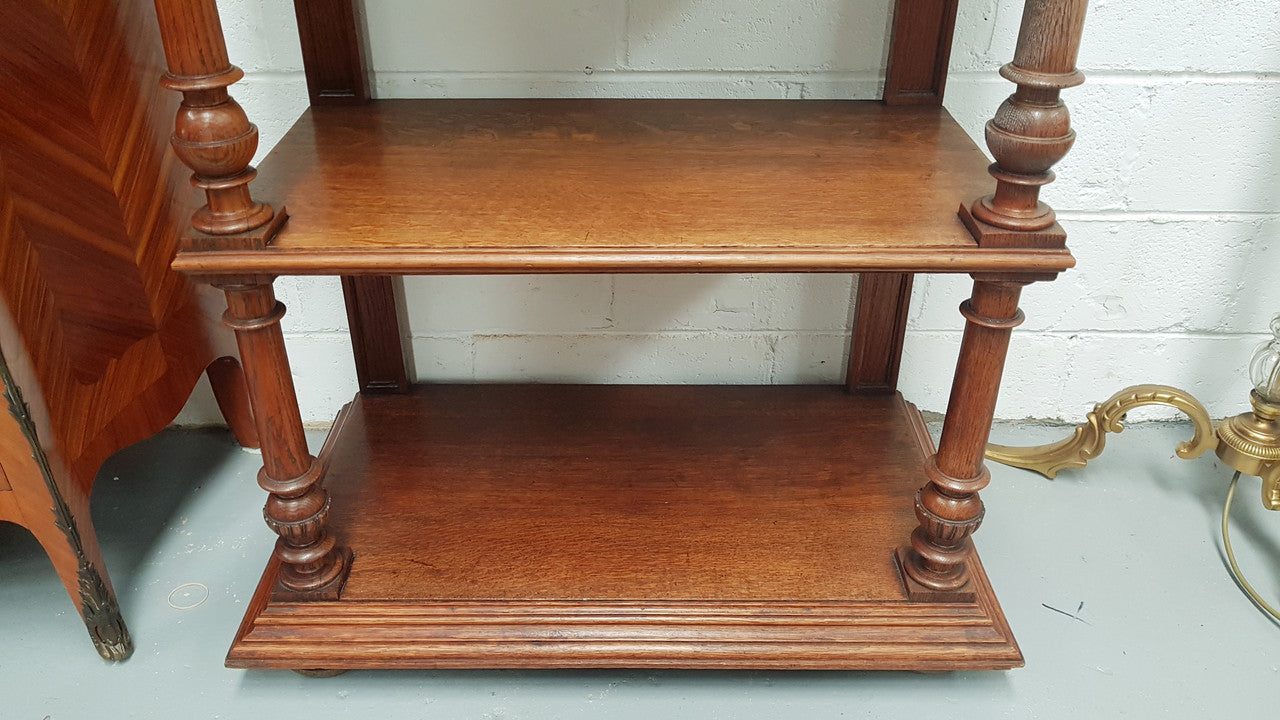 A French 19th century oak carved three tier cabinet. The cabinet/dumbwaiter has carved half border top that can be removed. Drawer for storage and in very good original condition.