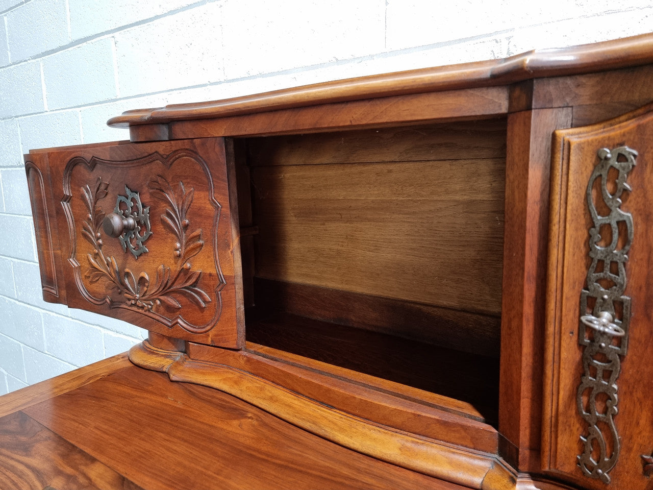 Stunning 19th Century French Walnut Buffet à Glissant from Provence, France. This is an exceptional charming piece and very functional with plenty of storage space, two large cupboards at the bottom, two drawers in the middle and two sliding doors either side at the top and finished off with a small central cupboard. In good original detailed condition.