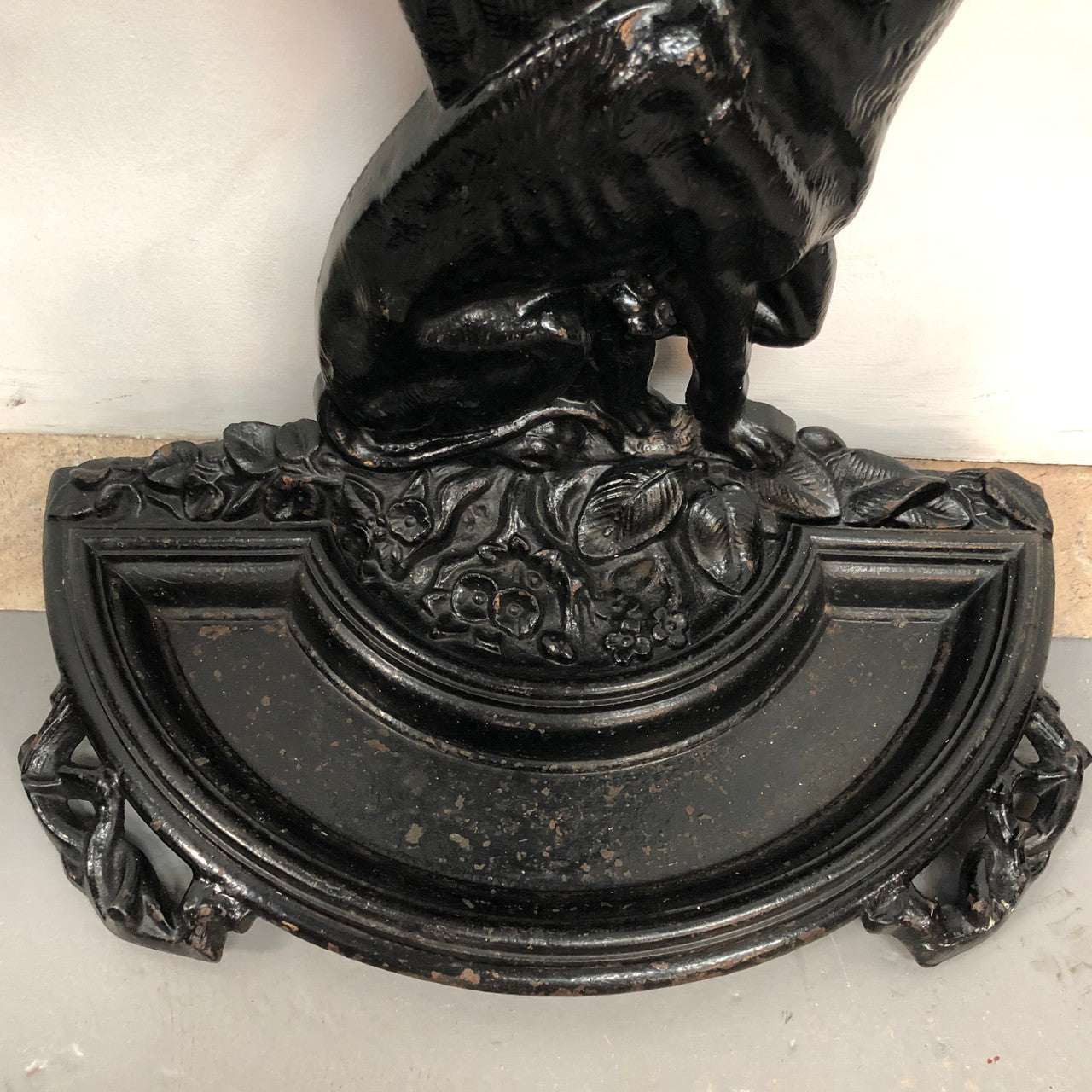 Black Cast Iron Umbrella Stand Displaying A Dog Under A Tree
