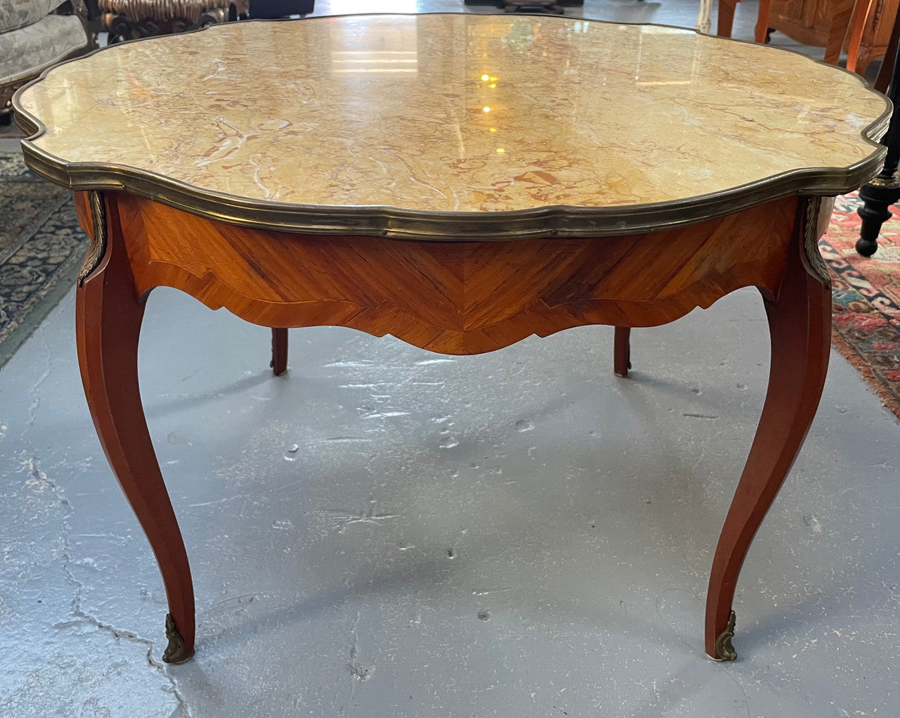 French Louis XV style marquetry inlaid marble top coffee table. In good original detailed condition.