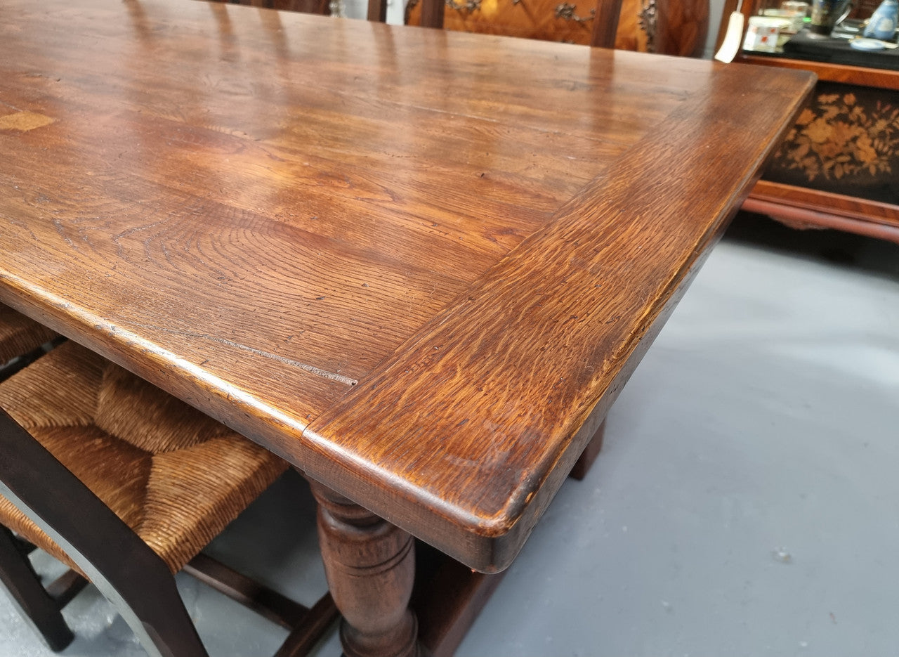 Vintage French Oak stretcher base farmhouse table. It is in good original condition.