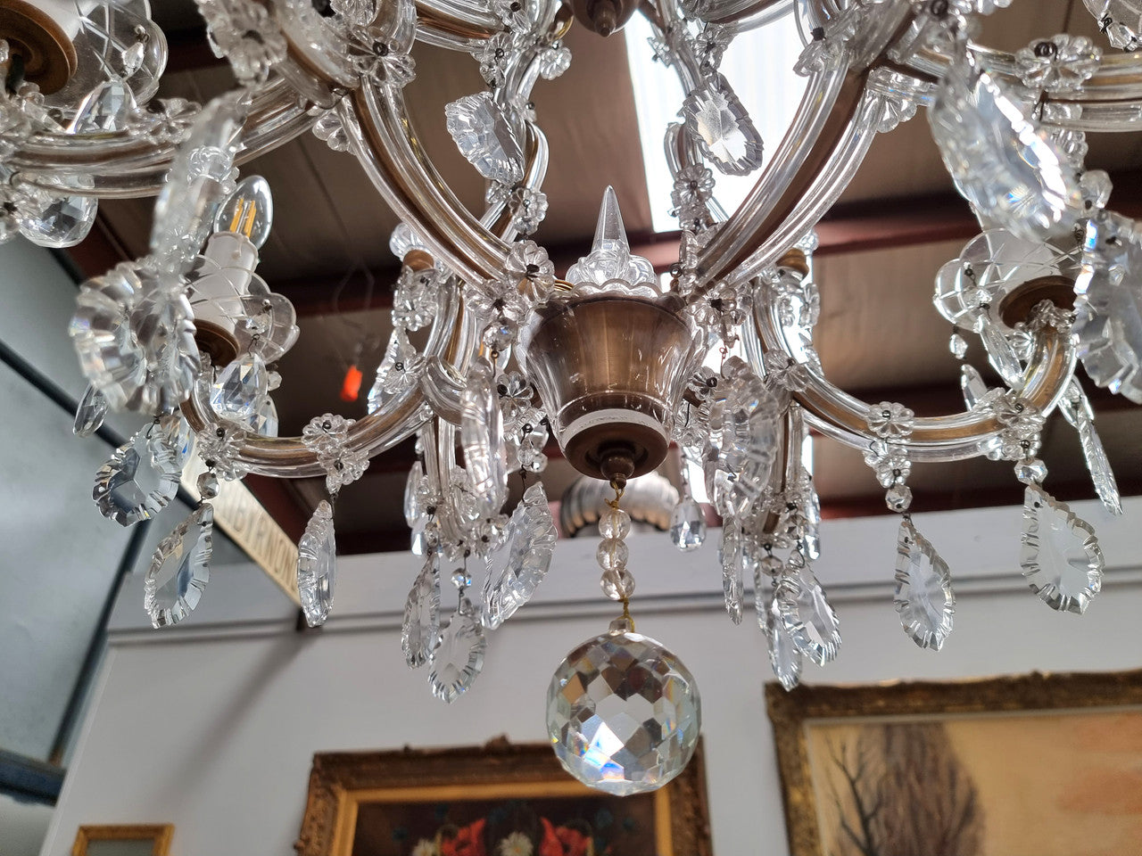 Sourced From France an attractive eight arm French crystal chandelier. It has been fully rewired to Australian standards and is in good original working condition.