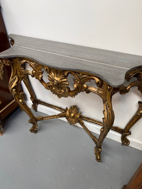 Antique French Louis XV style marble top console table & mirror set. Circa 1900 and it is in very good original condition.
