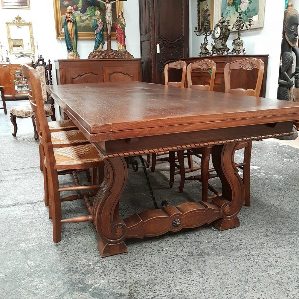 A set of six French Louis XV style, ladder back oak chairs. With finely carved detail and rush seat. In great original condition. Chairs are comfortable and sturdy for everyday use.