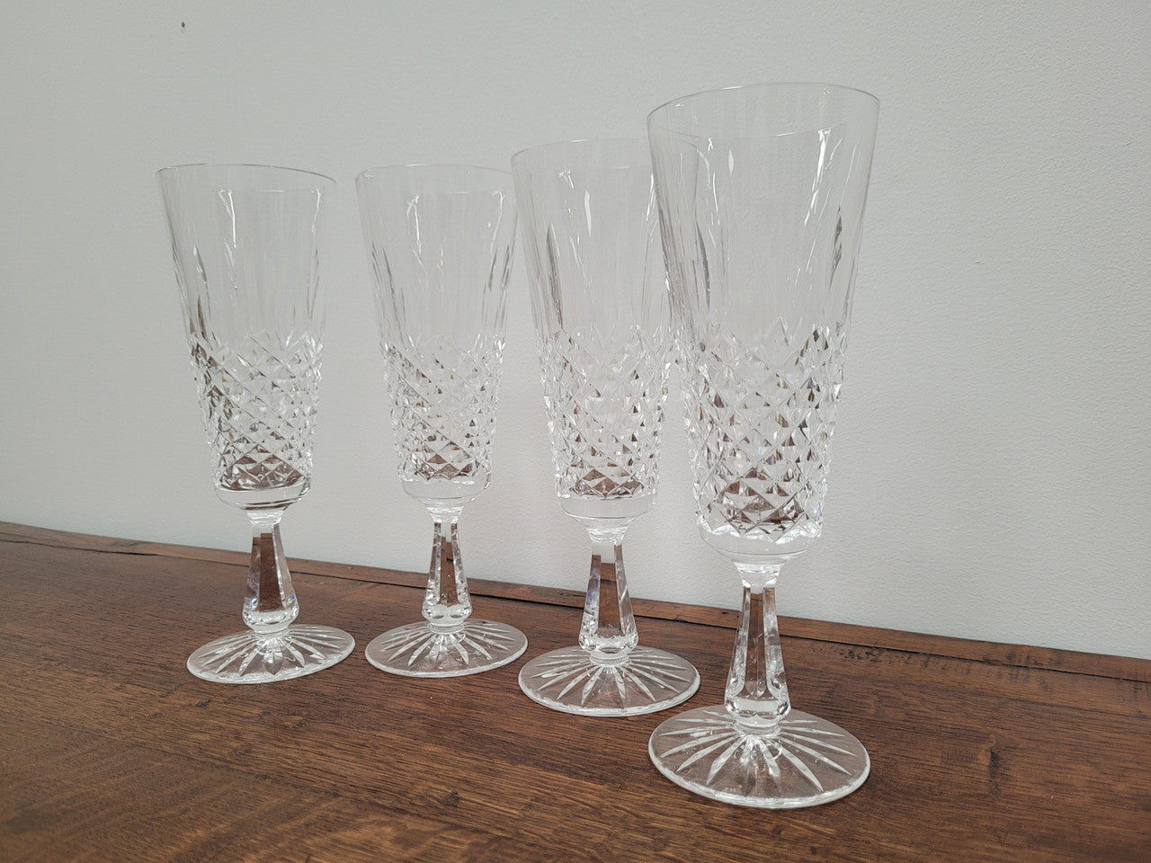 Set of four Waterford “Kenmare” pattern champagne flutes. In good original condition with no chips or cracks.