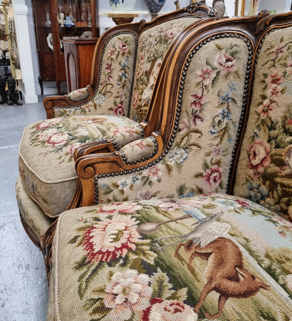 Pair of amazing French Walnut tapestry covered armchairs. The tapestry is in very good condition, please view photos as they form part of the description. Sourced from France and is in good original detailed condition.