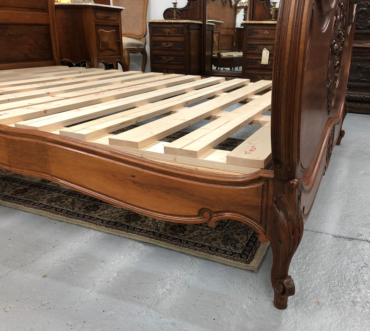French Walnut Louis XV style queen size bed. Comes with custom made slats, all you need to is place you mattress on top.