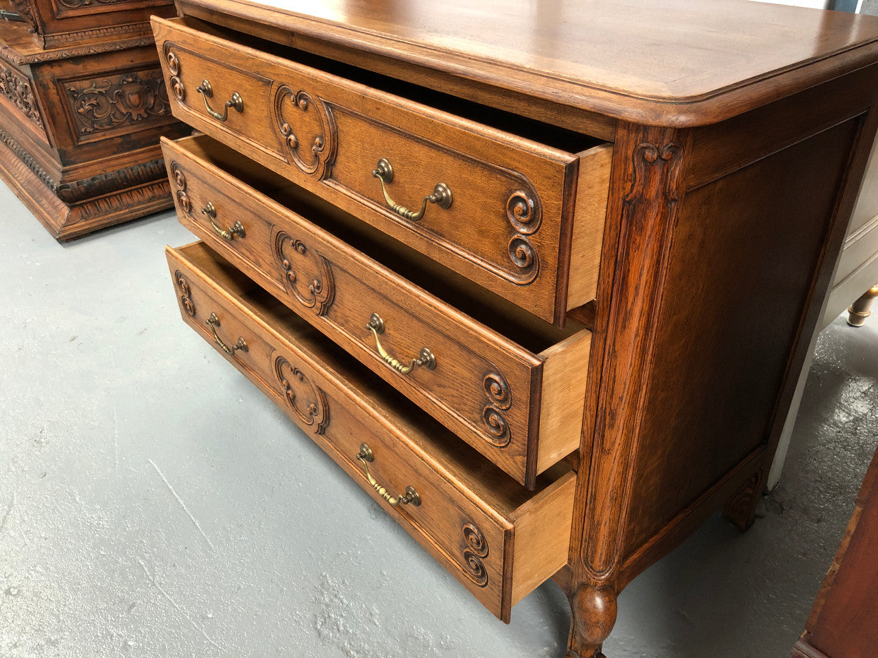 French nicely carved Oak chest of three drawers. In good original detailed condition.