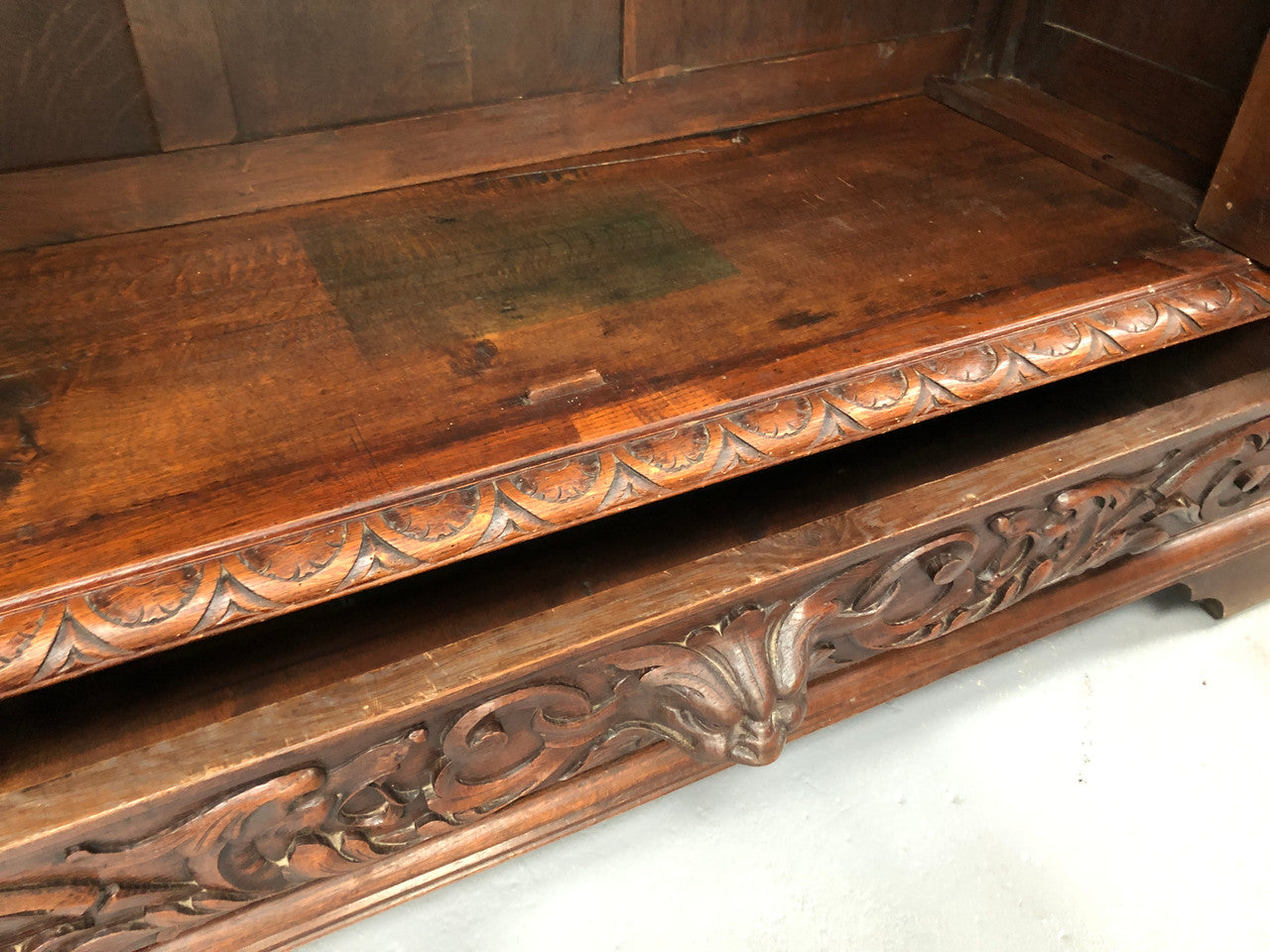 Amazing dark Oak heavily carved Gothic style bookcase with lovely details and adjustable shelves in good original detailed condition. The doors currently have no glass which can easily be added or be left with open shelves.