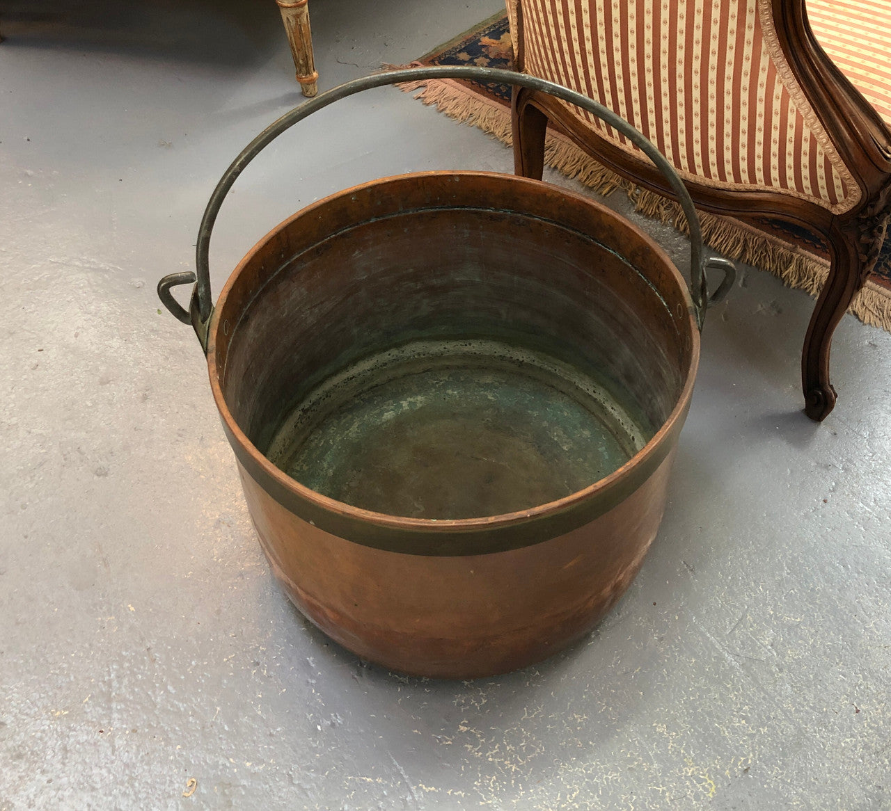 French Antique Copper pot with a lovely brass band and has a handle in good original condition.
