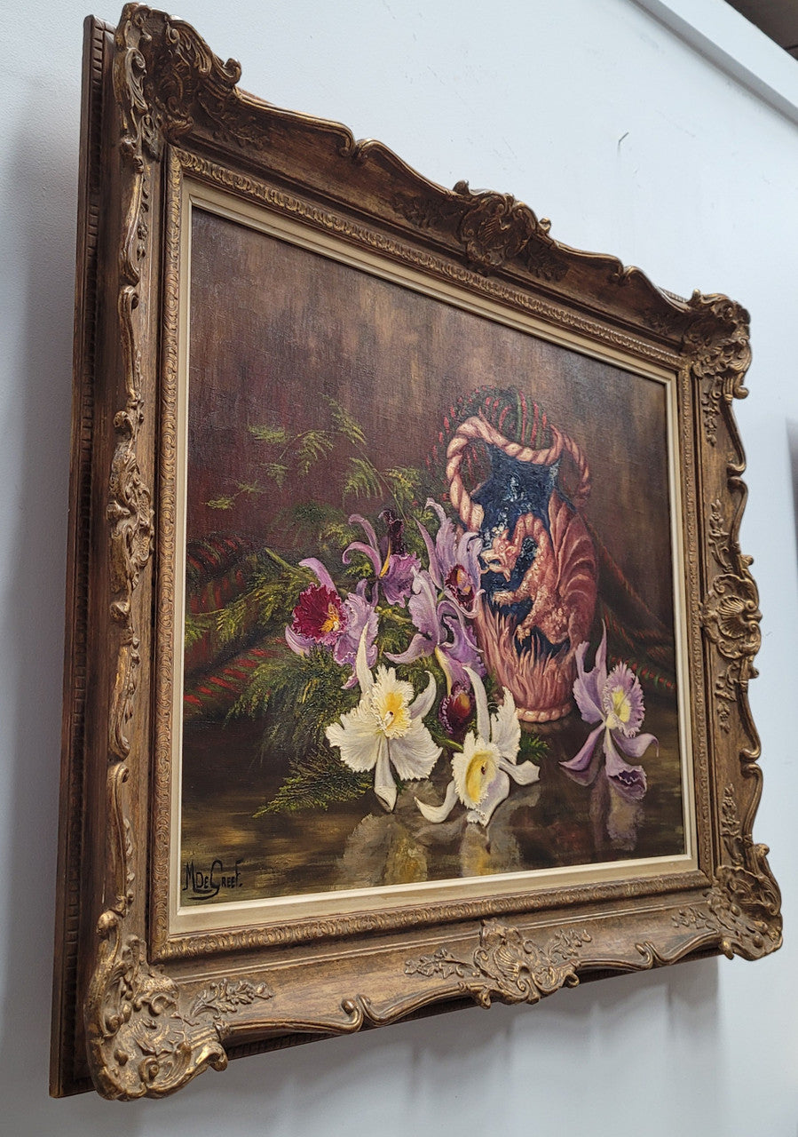 Stunning oil on canvas still life of flowers and vase painting in gilt frame. Sourced in France and signed by Belgium artist M.Degreef. It is in good original detailed condition.