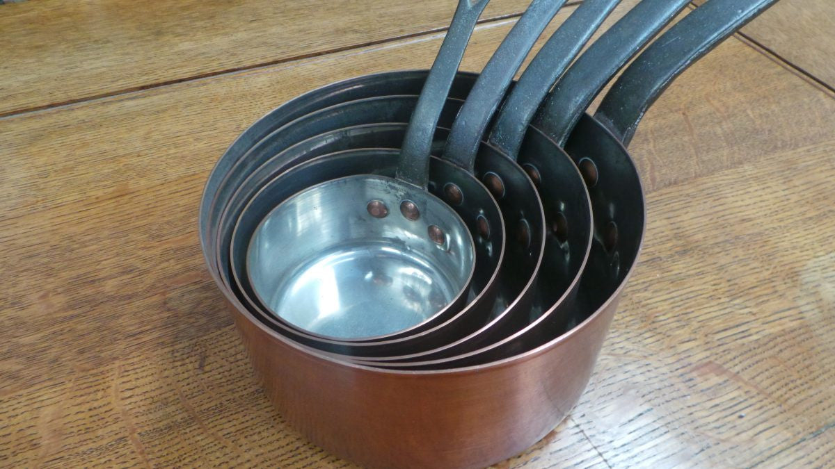 Set of Five French Copper Saucepans