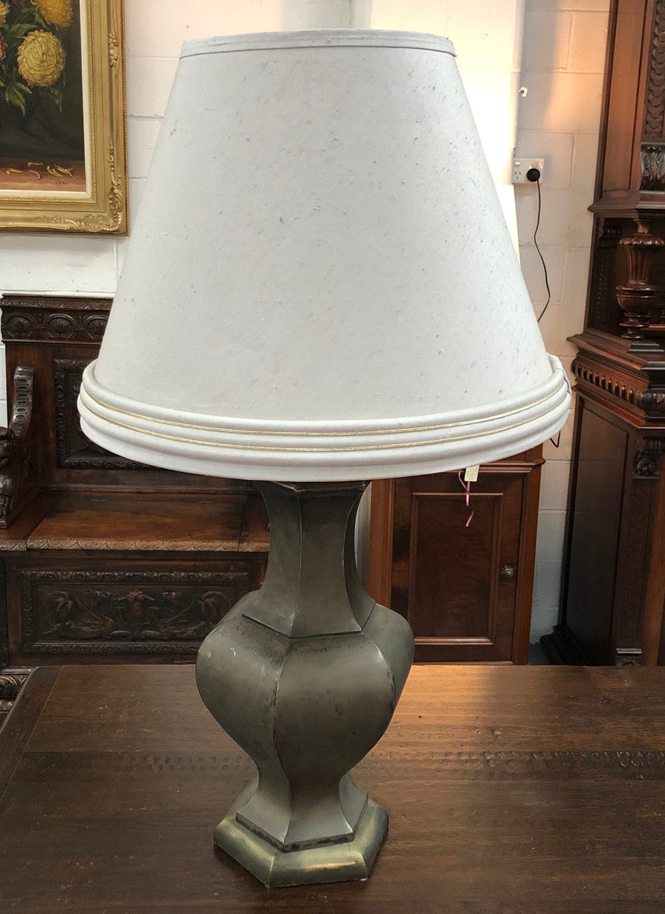 Beautiful pair of 19th Century pewter covered Bronze table lamps with light grey shades .They have been rewired and in good working order.