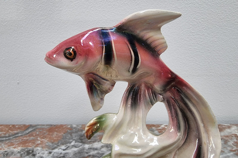 Vintage “Jema Holland” ceramic fish and snail statuette.