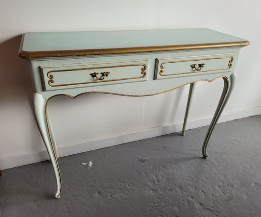 Vintage French Louis 15th style original painted and gilded highlights two drawer console table. It has been sourced from France and is in good original condition.