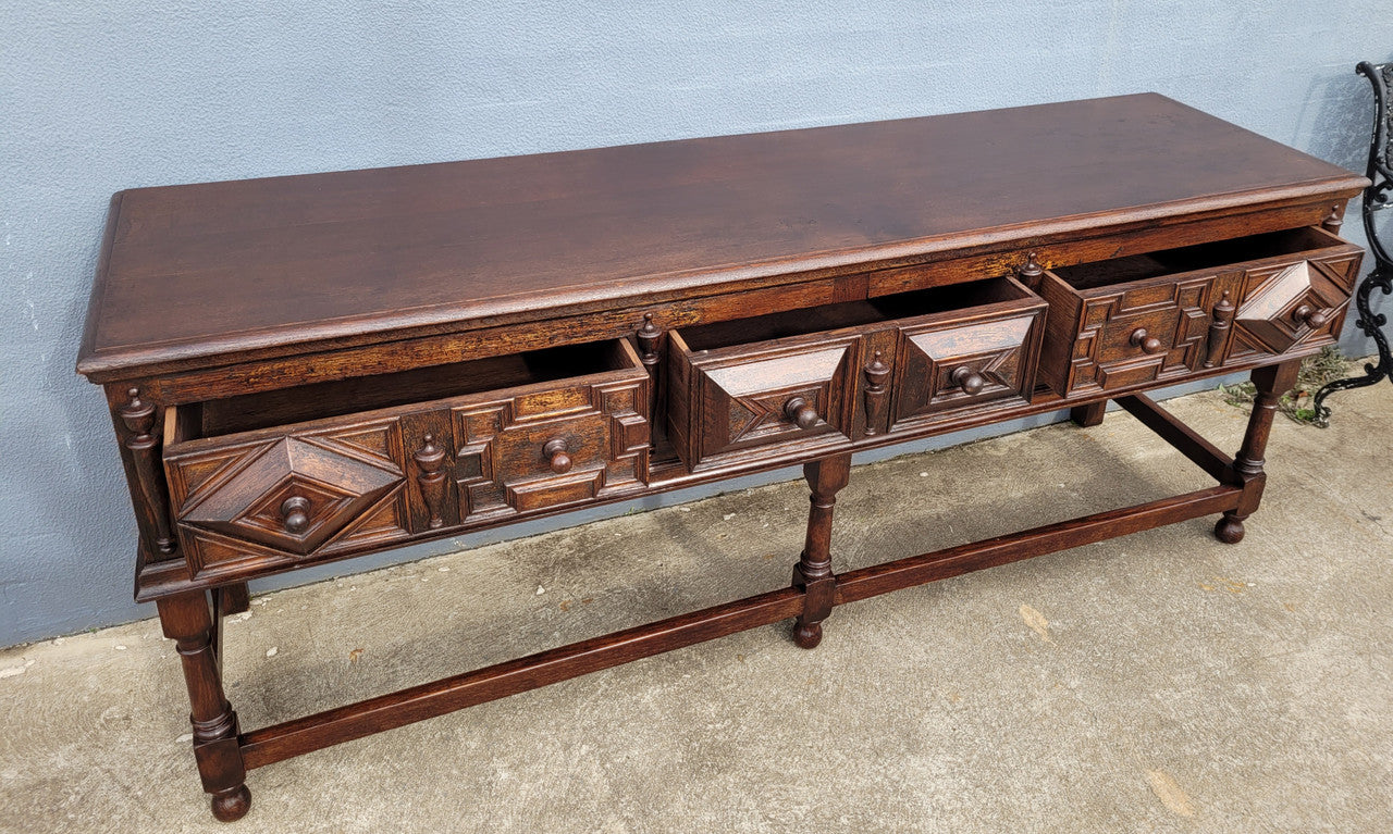 19th Century French Oak Henry the 2nd style console/side table/ TV unit with two drawer with beautiful carvings. It is in good original detailed condition.